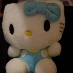 Adorable Plush Toy with Blue Outfit and Bow